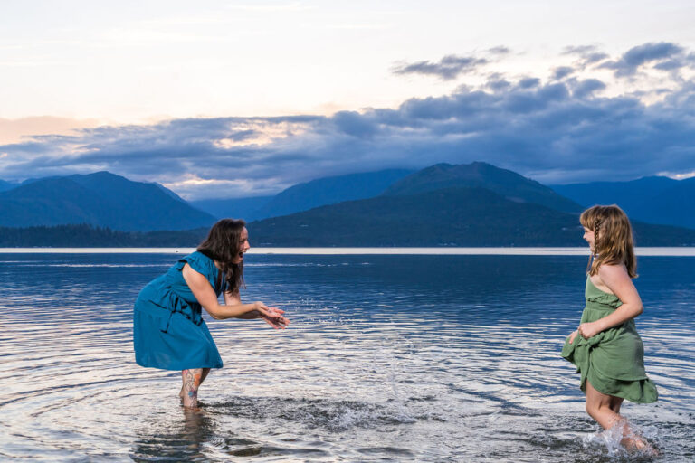 Mother and child laughing and playing during a Kitsap County family photo session. What to bring family photo session Kitsap.