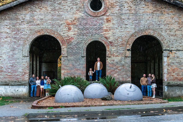 Family at Manchester state park with iconic building