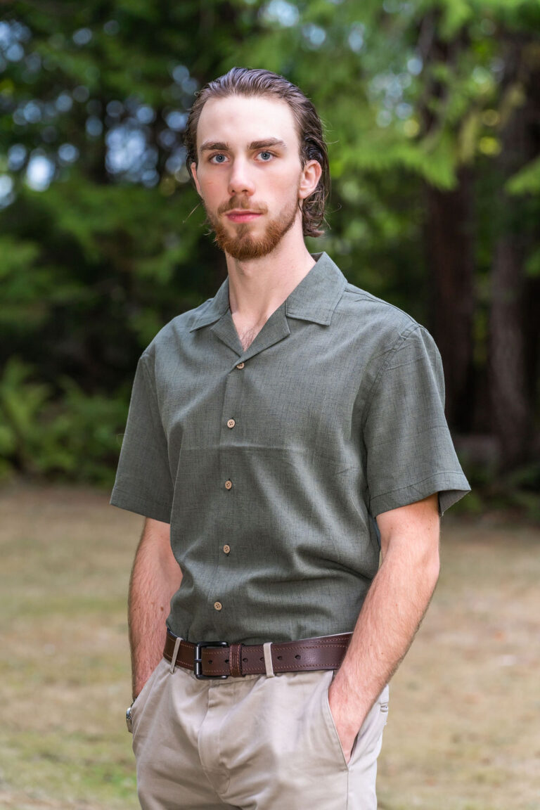 Portrait of a young man posed during a session at Scenic Beach State Park