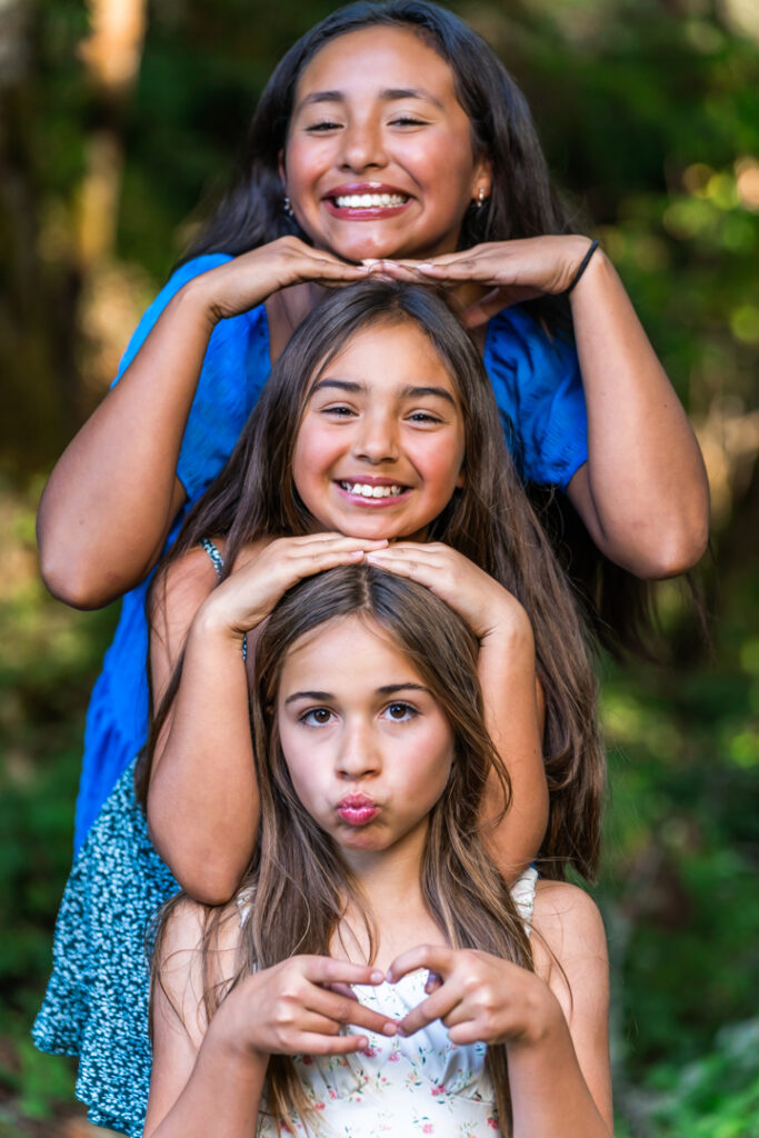 Three young girls posed at Manchester State Park.