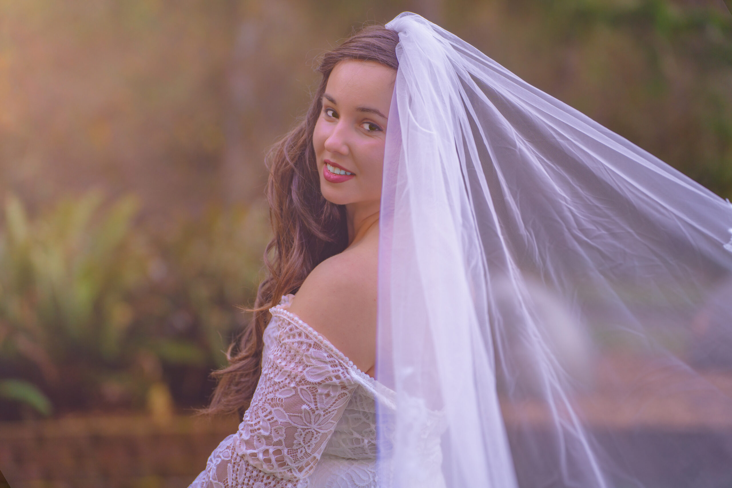 Bride looking back at camera.