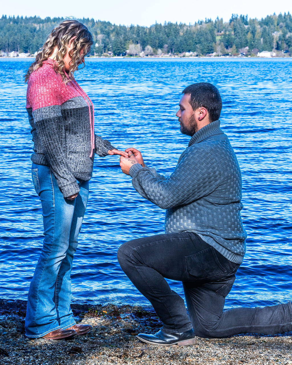 Surprise proposal photographer capturing a man proposing at Manchester State Park in Kitsap County, Washington