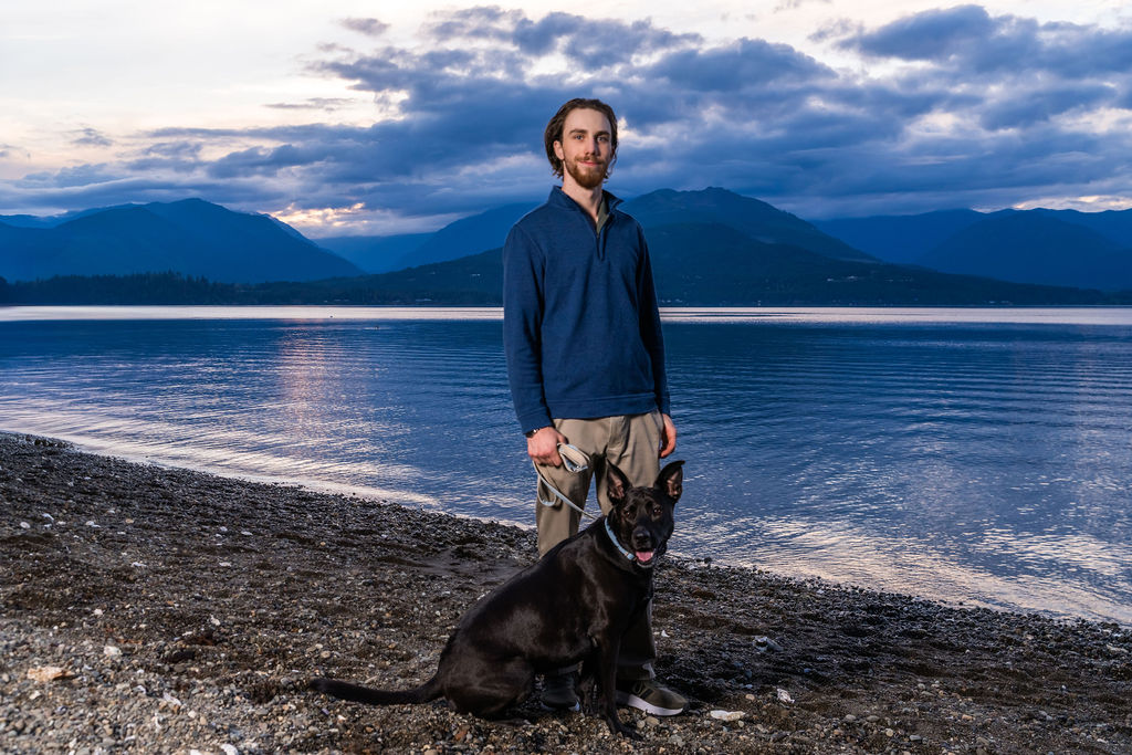 Senior with dog at Scenic Beach State Park.
