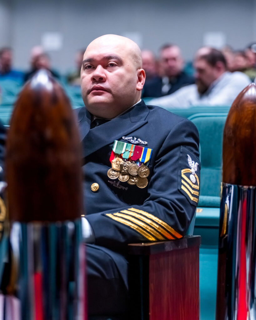 Master chief seating during ceremony.