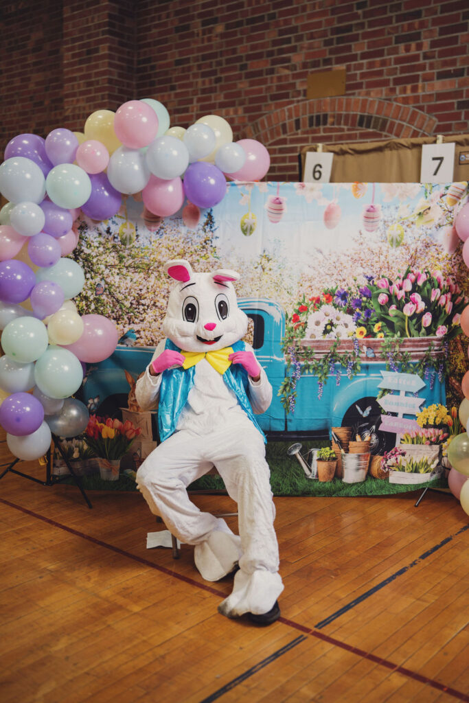 EASTER BUNNY PULLING TIE LOOKING GOOD