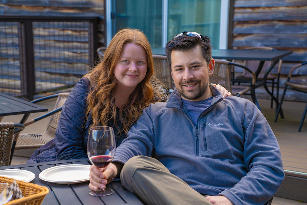 couple enjoying wine tasting at olalla vineyard winery in olalla washington