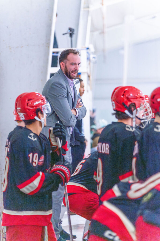 Coach telling the players what to do