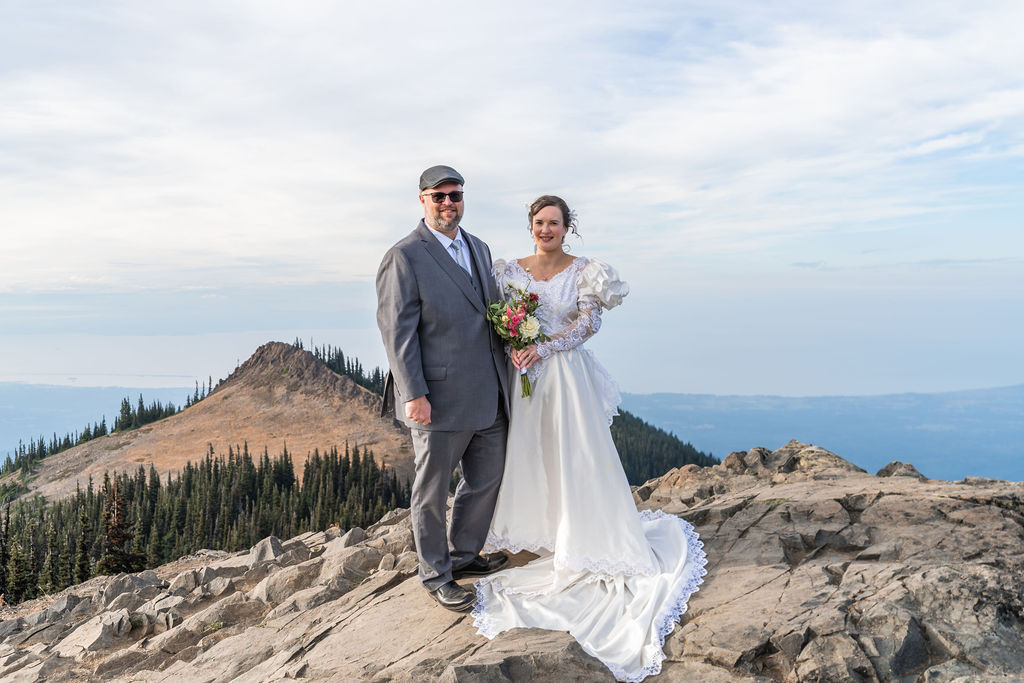 vow renewal couple overlooking the Olympic Mountains at Blue Mountain near Port Angeles