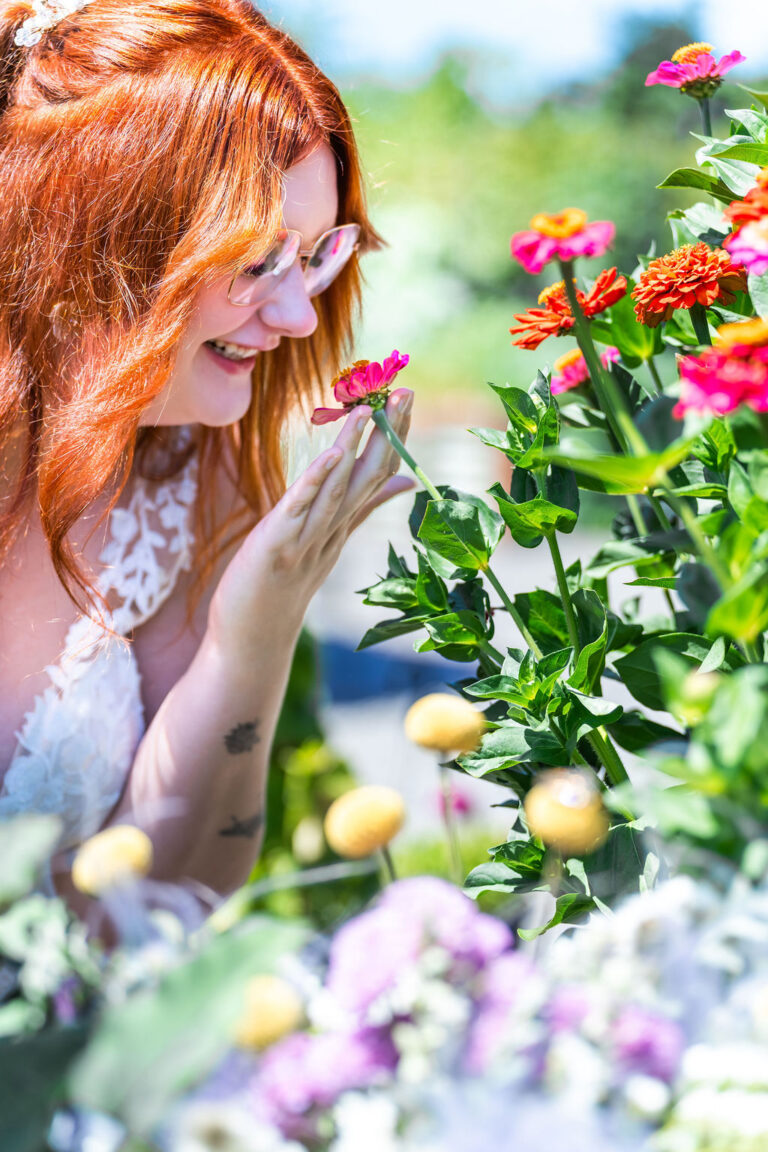 Bride holding a wildflower bouquet during a portrait session at Vickery Gardens near Tacoma