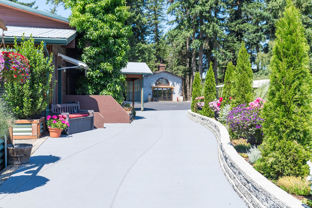 Beautiful landscaped entrance and walkway at Vickery Gardens wedding venue near Tacoma Washington