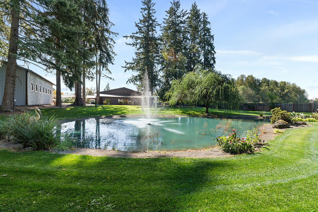 Scenic pond and landscaped grounds at Vickery Gardens wedding venue near Tacoma Washington