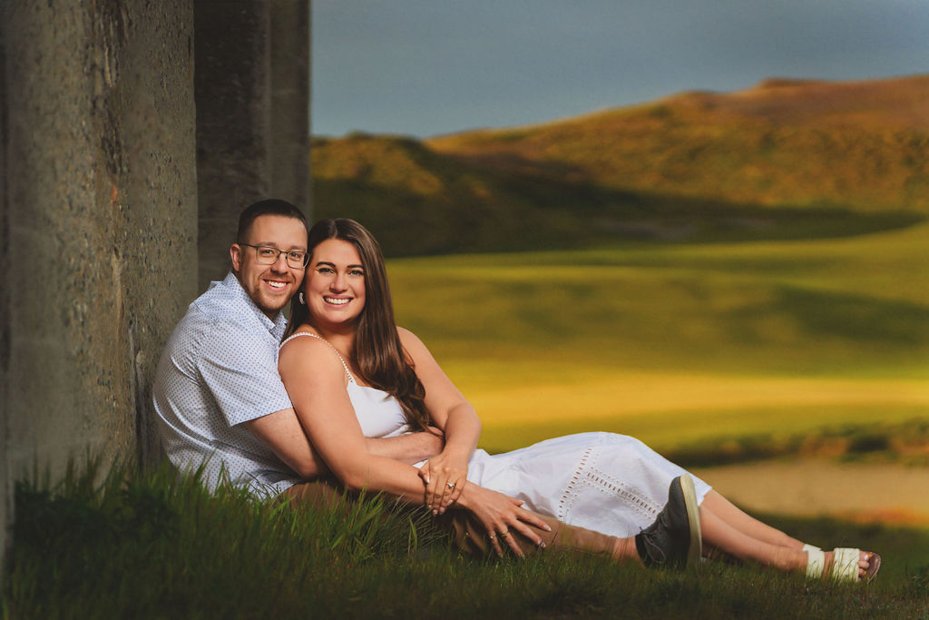 Sitting couple with views of the golf course at Chambersbay golf course.