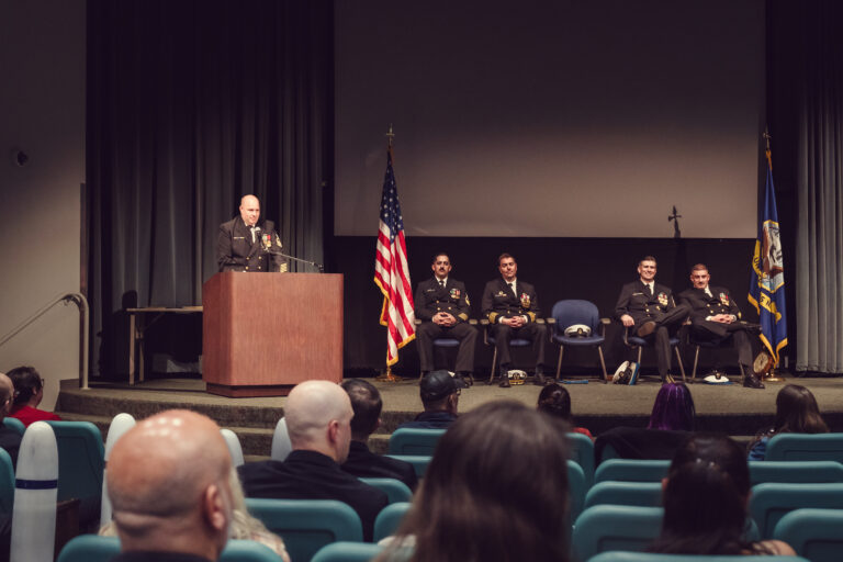 Retiring sailor giving remarks during a Navy retirement ceremony in Kitsap County. Navy retirement ceremony photos Kitsap County.