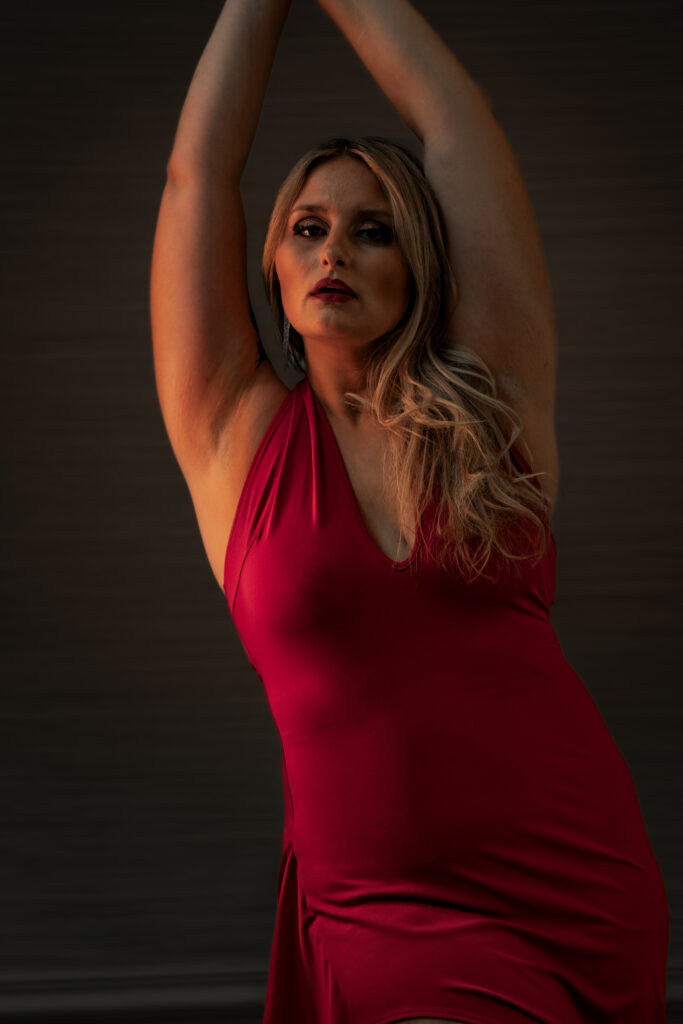 Portraits of Alyssa S in red dress posing