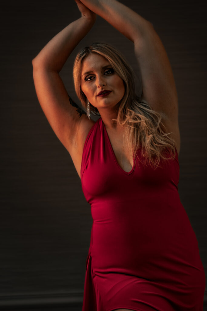 Portraits of Alyssa S in red dress posing