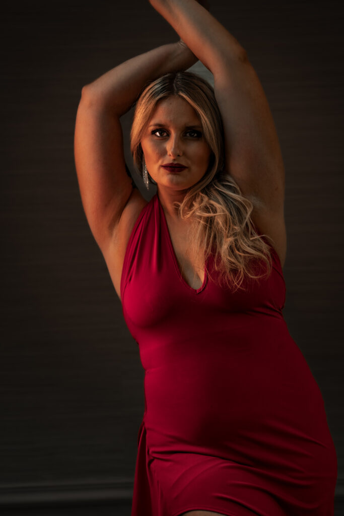 Portraits of Alyssa S in red dress posing