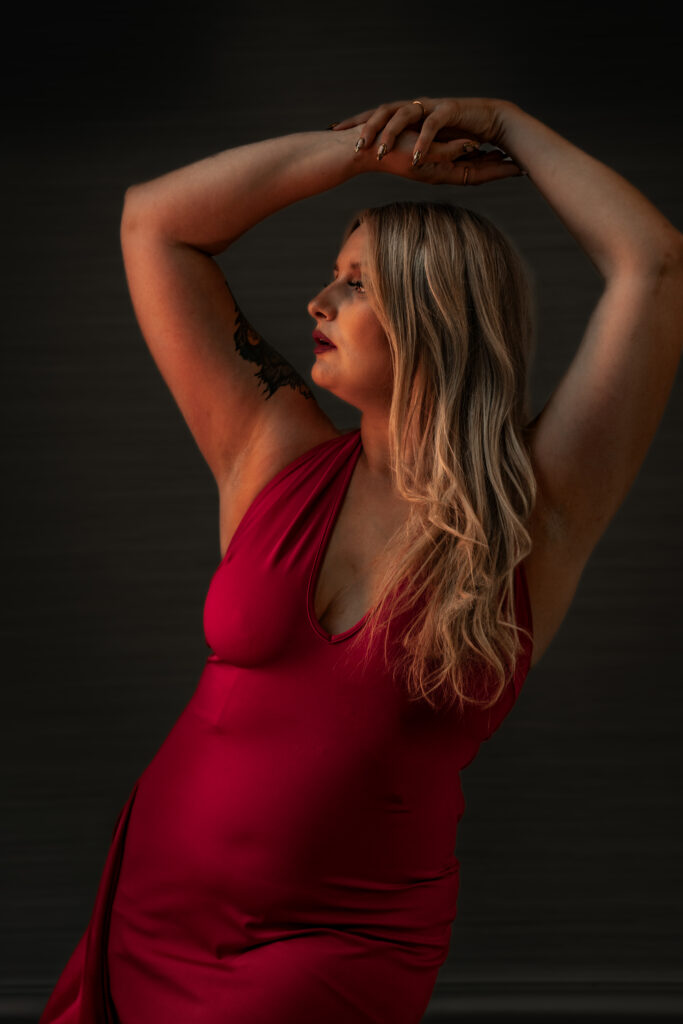 Portraits of Alyssa S in red dress posing