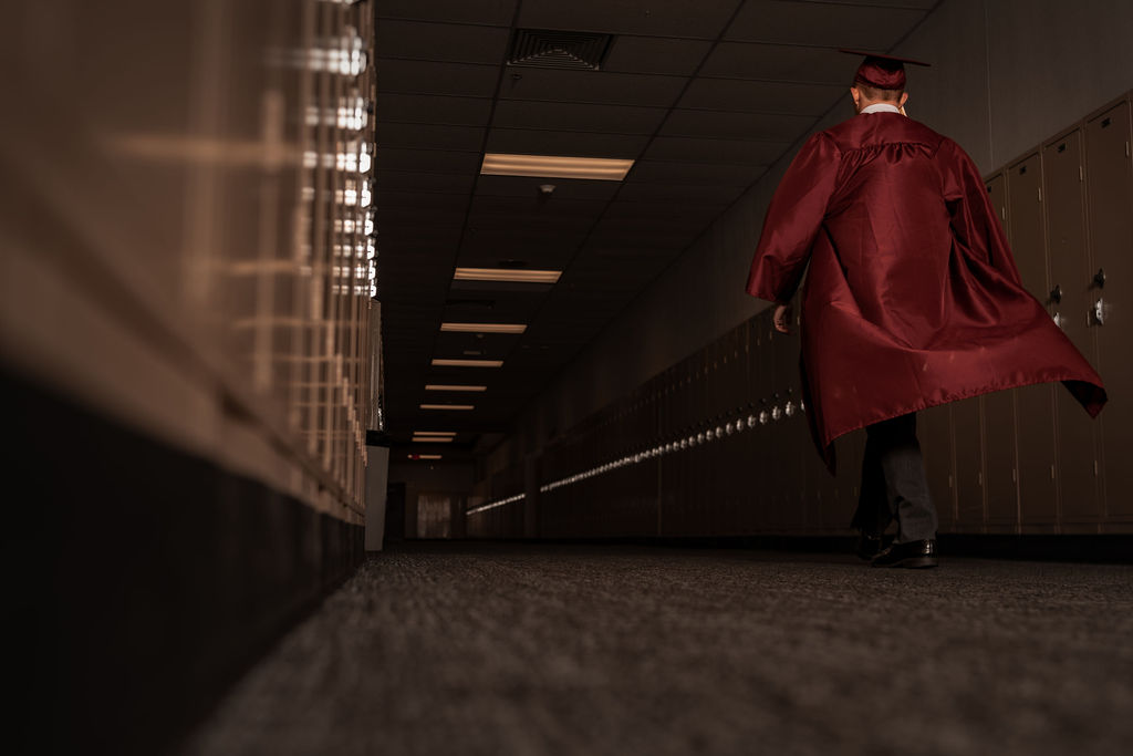 Senior walking South Kitsap highschool during photoshoot.