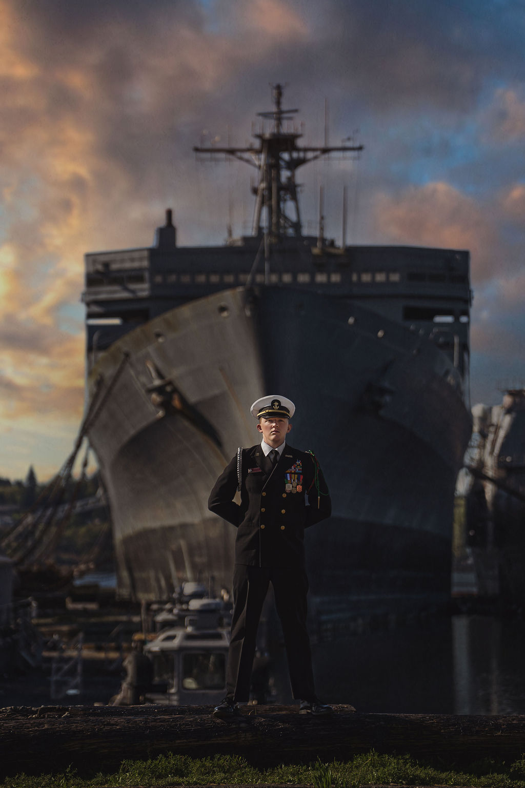 Epic shot of ROTC Senior in Bremerton with navy ship in background.
