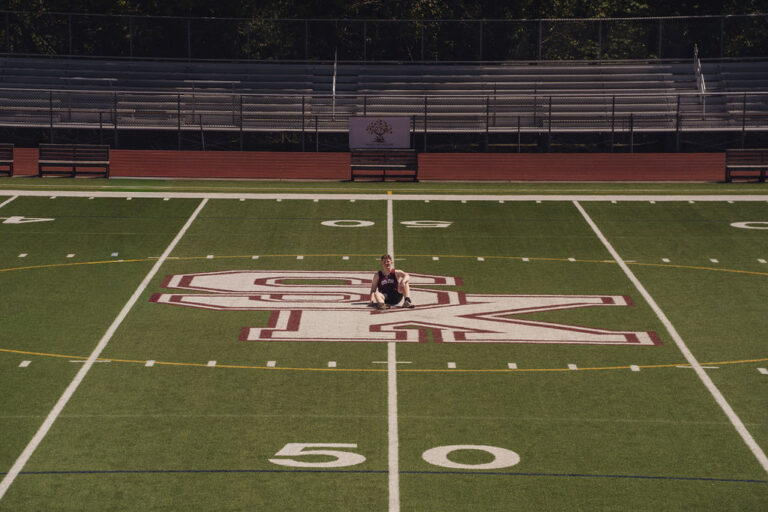 Kitsap senior showing personal identity in his senior pictures, a 2027 trend