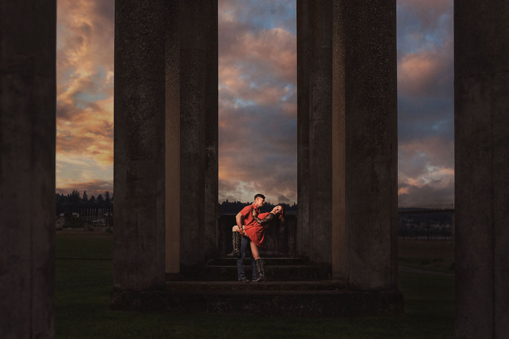 Madison and John Portrait at Chambers bay in Tacoma Washington job dipping Maddison with pillars surrounding her