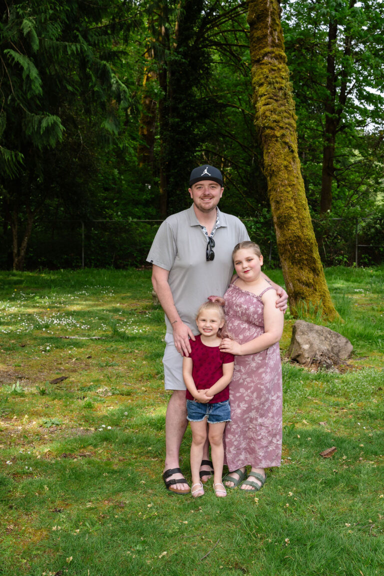 Family of four at a green Kitsap County park