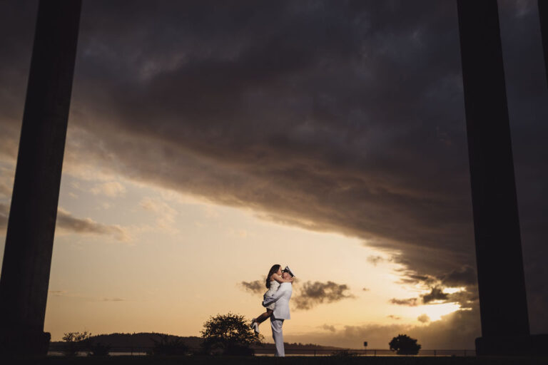 Engaged couple holding hands at Chambers Bay during a Tacoma engagement session