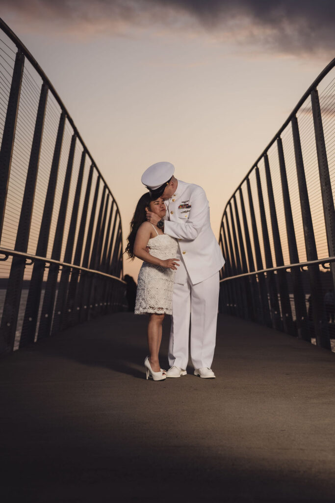 Engaged couple walking at Chambers Bay at sunset, Tacoma engagement photography