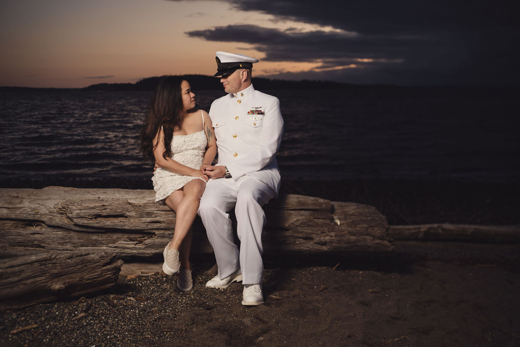 Golden hour engagement photos of a couple at Chambers Bay in Tacoma Washington