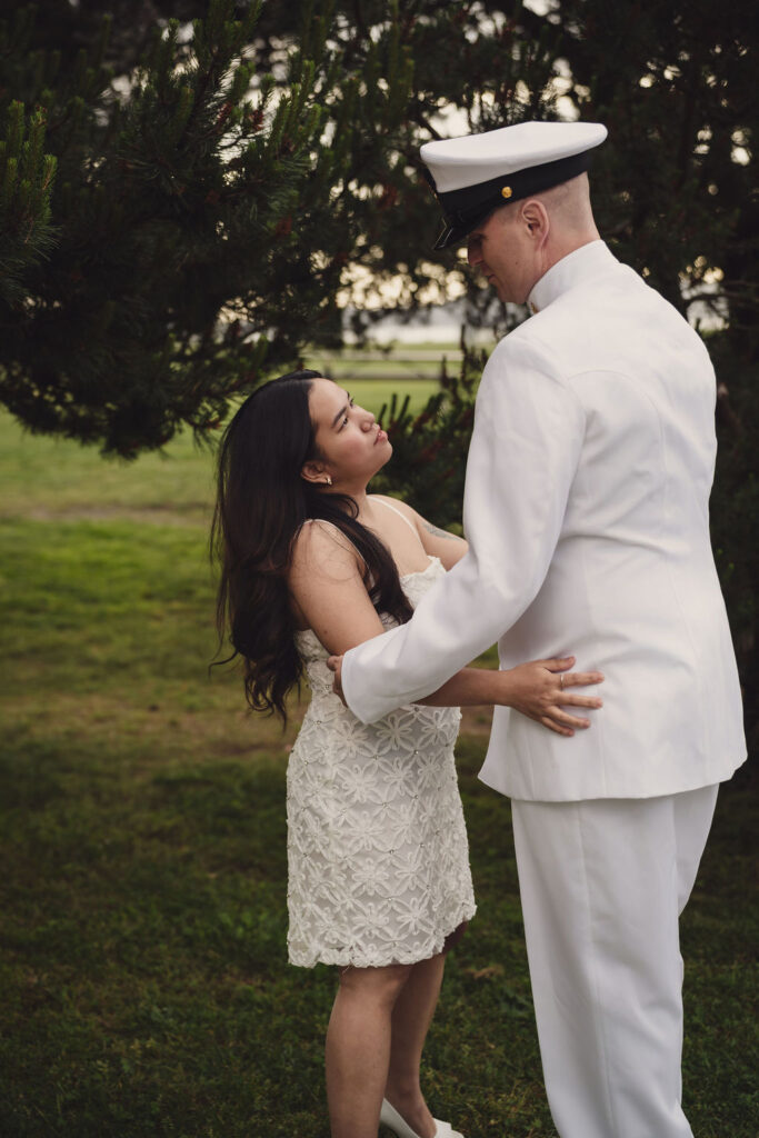 Close engagement portrait at golden hour at Chambers Bay in Tacoma Washington