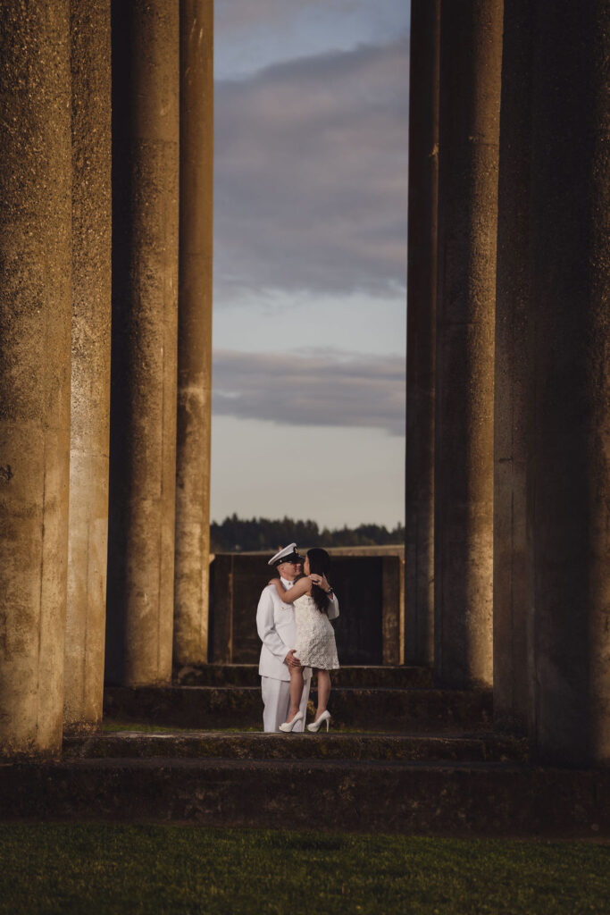 Engaged couple gazing at each other at sunset at Chambers Bay in Tacoma