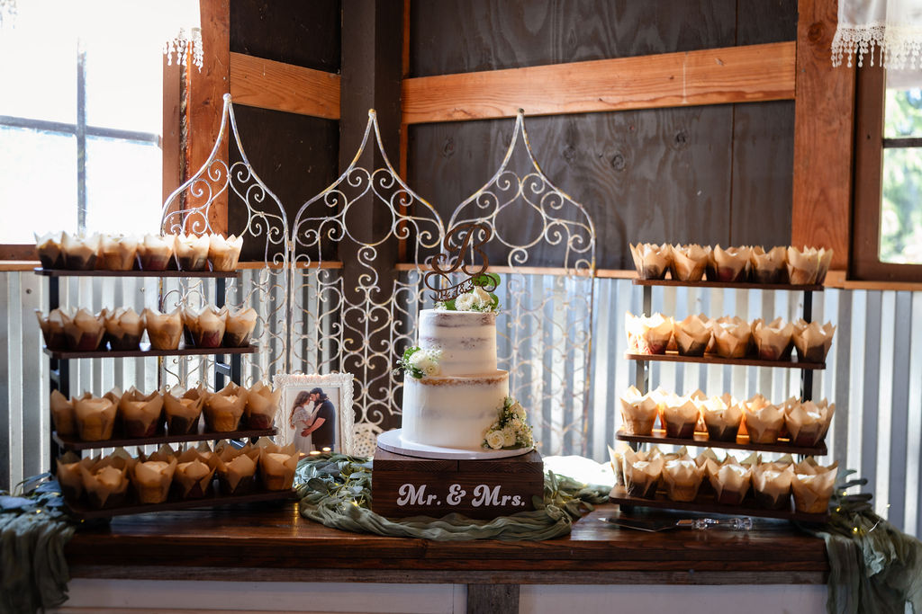 Rustic barn interior with string lights at the Mason Jar Gathering Barn in Onalaska, Washington