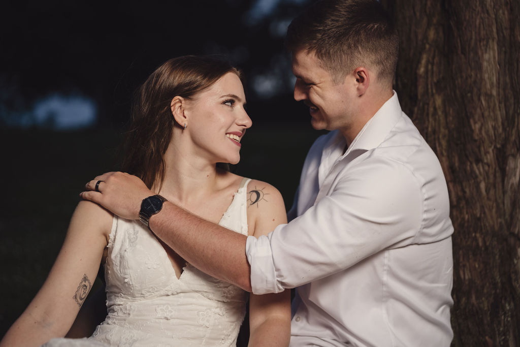 Tacoma rose garden engagement photos with the gazebo behind the couple
