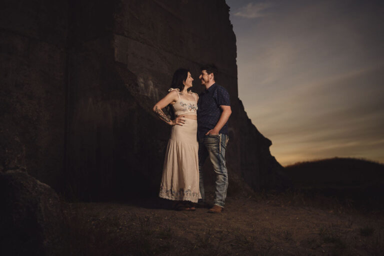 Couple standing together at dusk at Chambers Bay near Tacoma