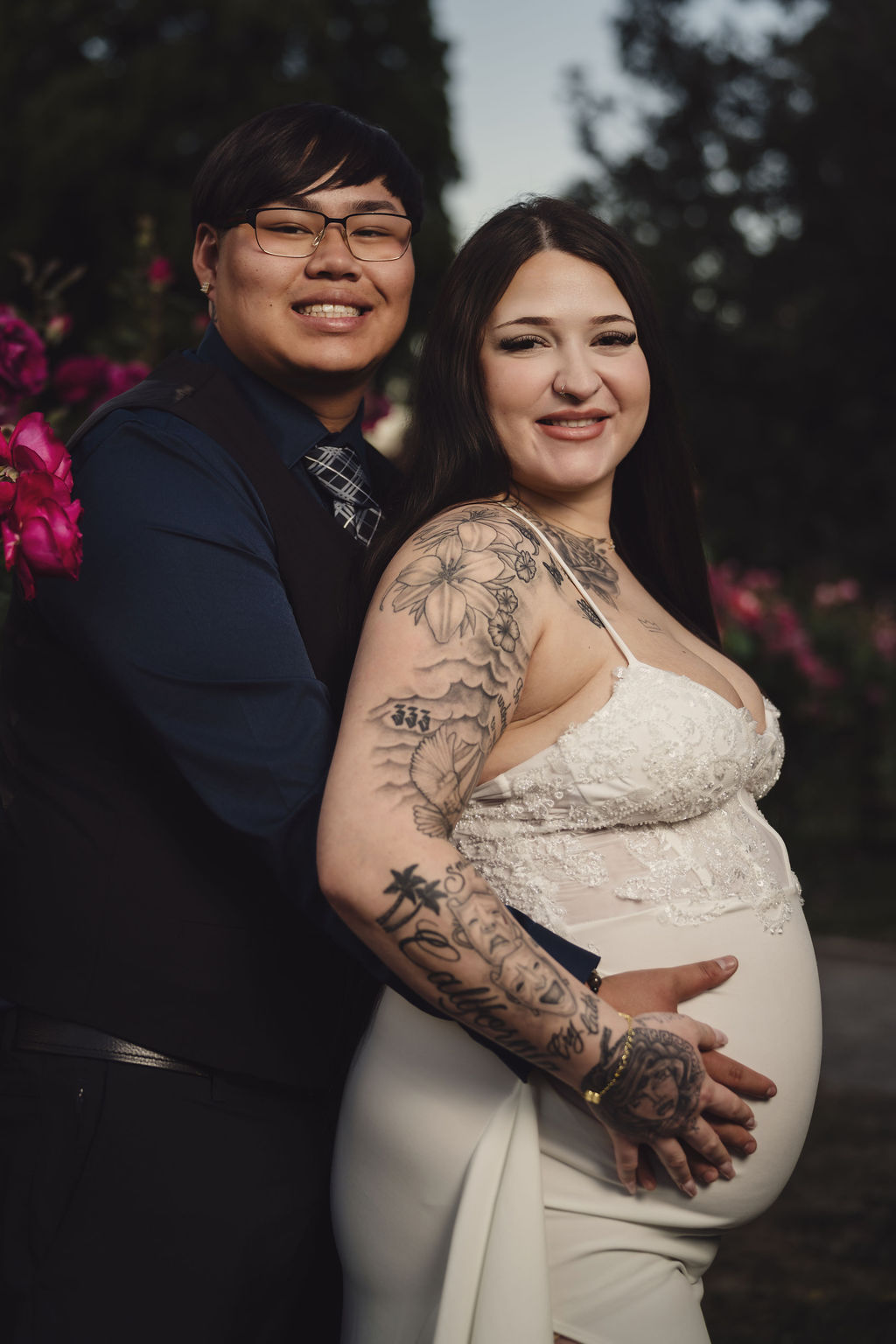 Romantic engagement portrait in the rose garden archway at Point Defiance Park, Tacoma WA, Nautical Moments Photography