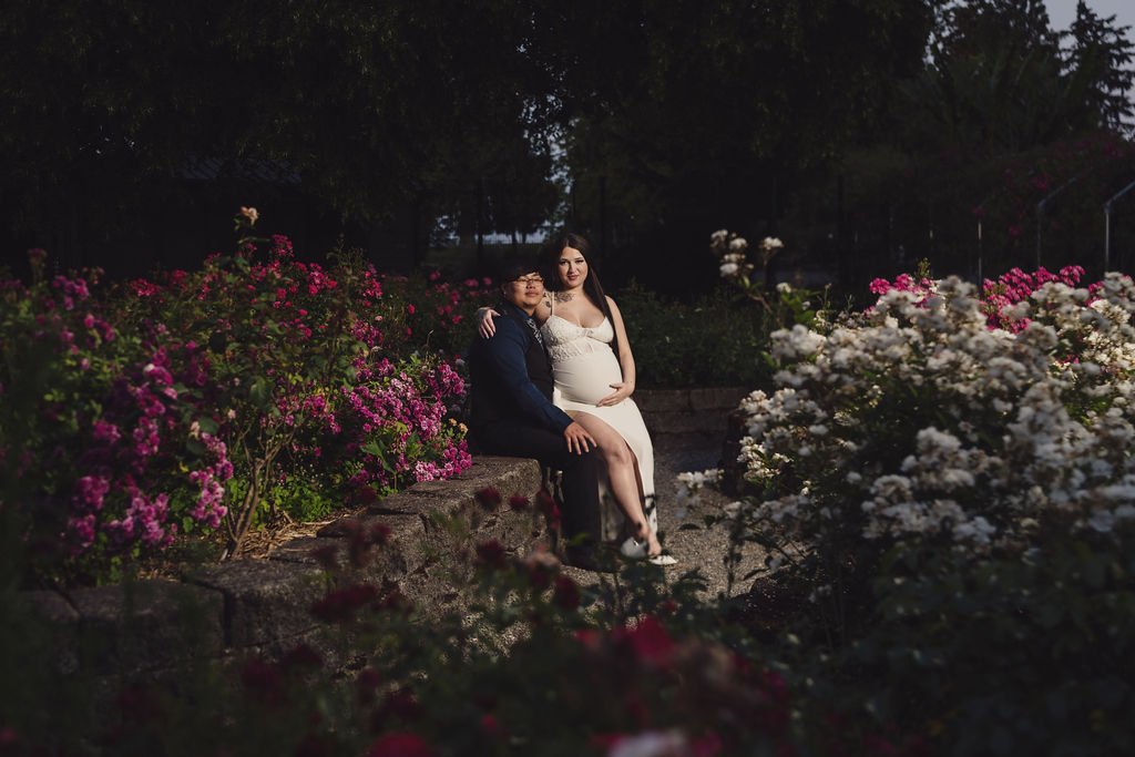 Couple touching foreheads in the rose garden at Point Defiance Park, Tacoma WA engagement photographer