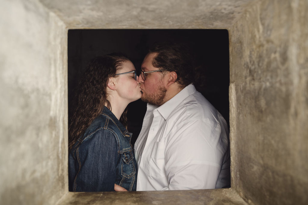 Engaged couple at the historic gun batteries at Fort Casey State Park