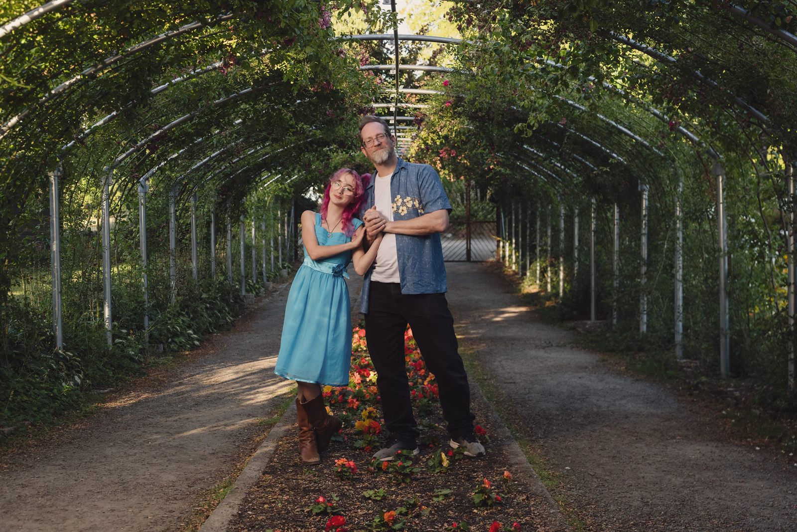 Family portraits inside the rose arbor tunnel at Point Defiance Rose Garden in Tacoma