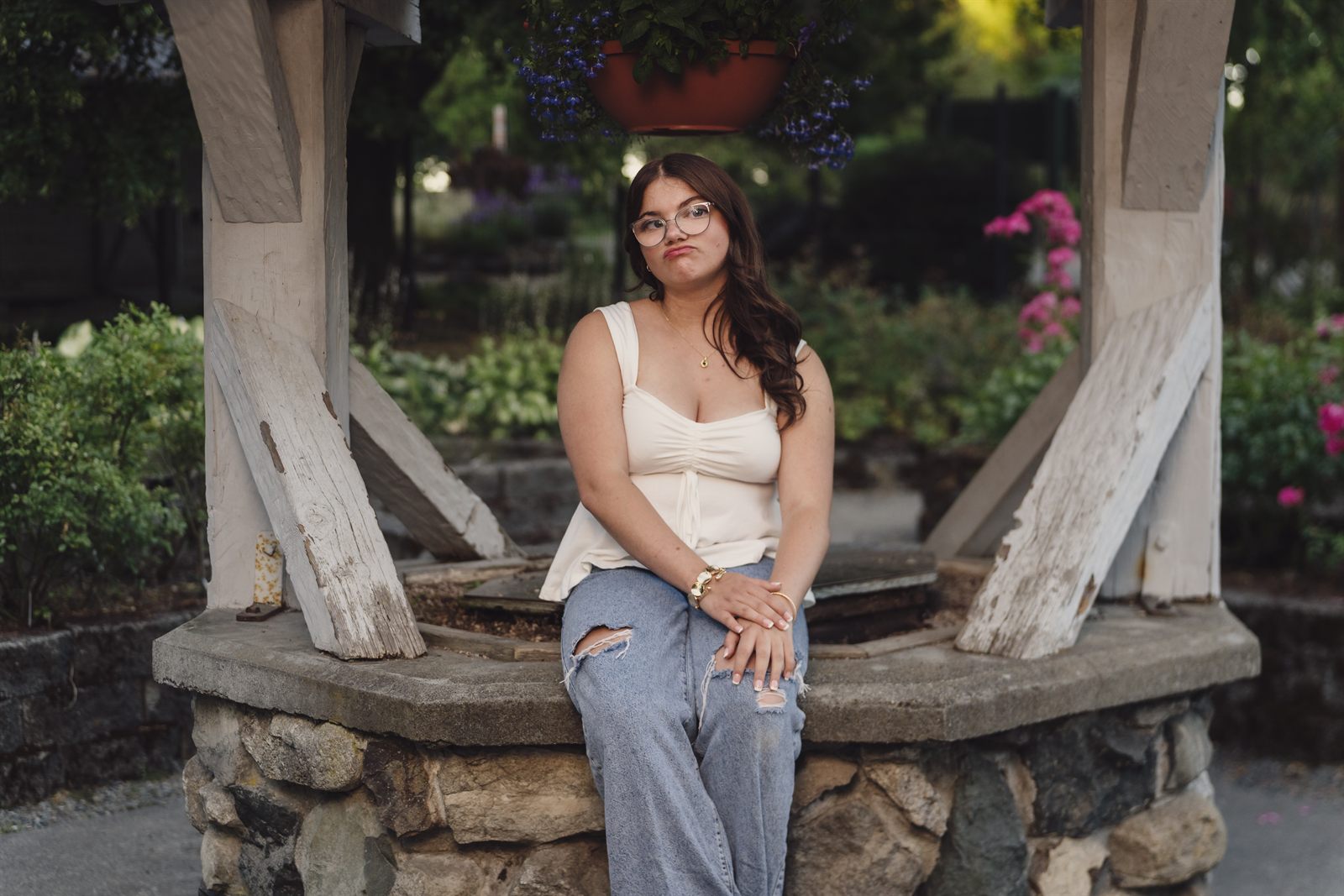 Portrait at the historic wishing well at Point Defiance Rose Garden in Tacoma