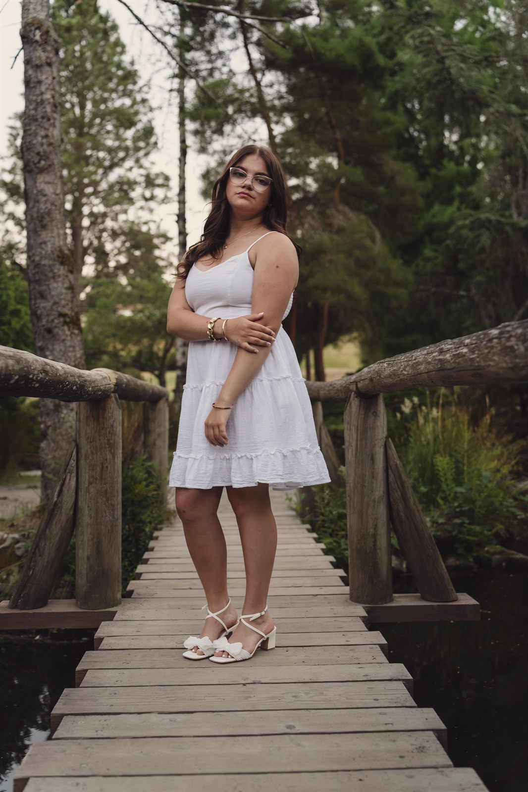 Portrait on the wooden footbridge over the pond at Point Defiance Park in Tacoma