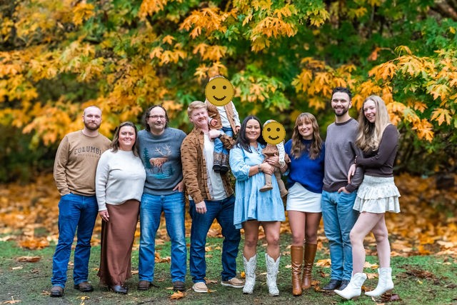 Extended family portrait among golden fall foliage in Western Washington