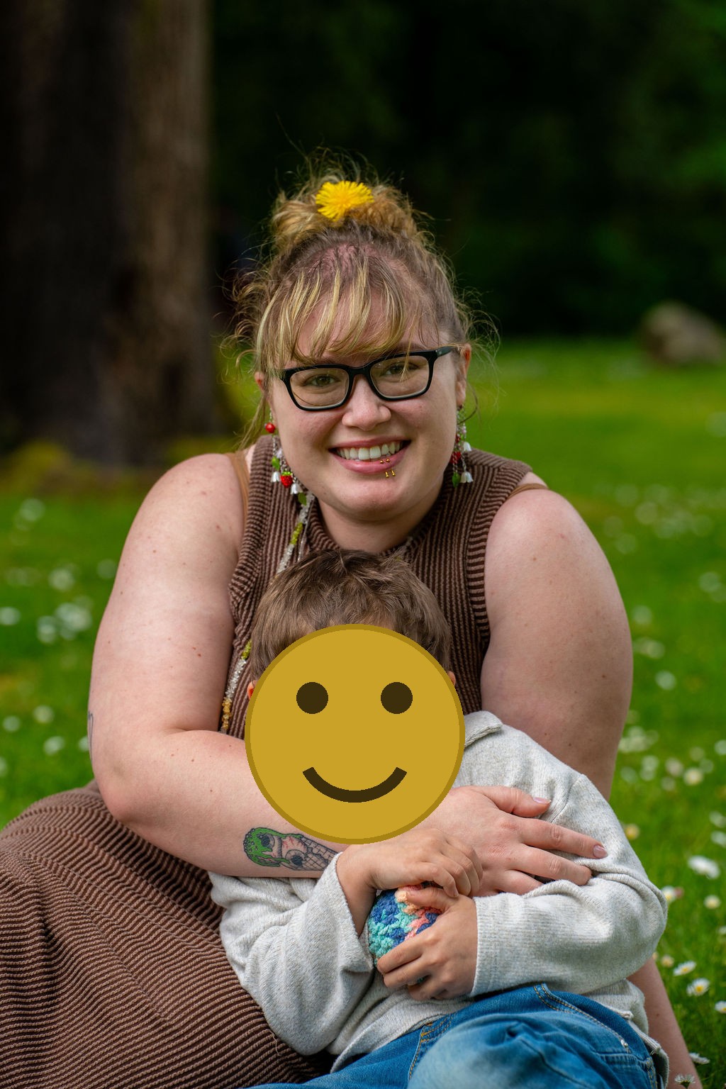 Family photo session with a mother hugging her young son at a park in Kitsap County, Washington