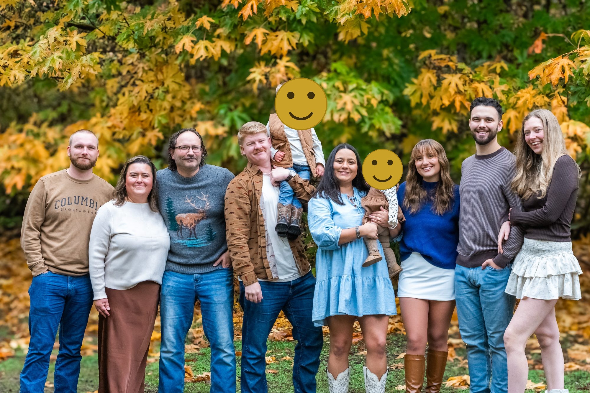Extended family among golden fall maples at Manchester State Park, little ones faces covered for privacy