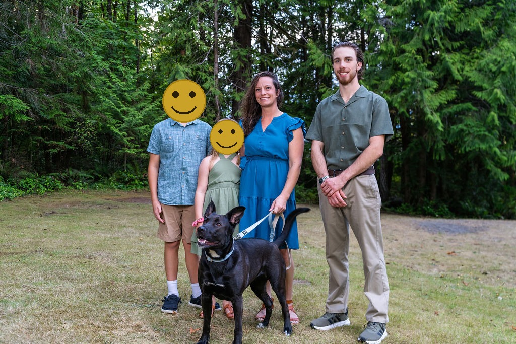 Dog with family at scenic beach state park