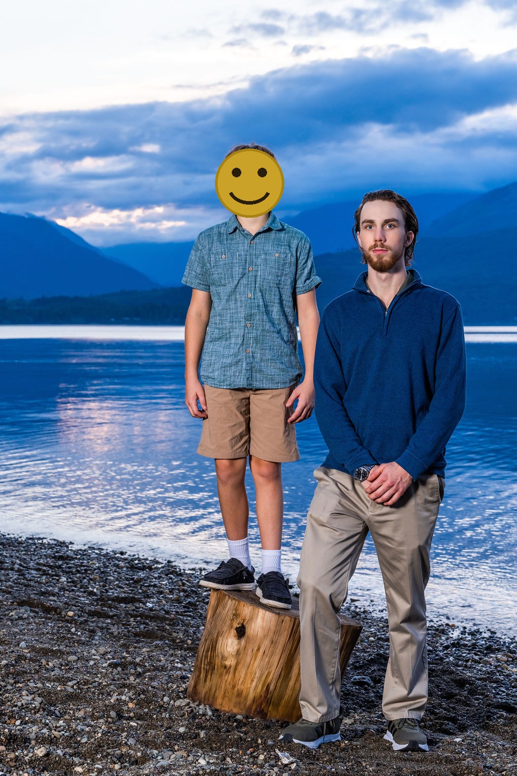 Two brothers standing on the beach at sunset during a family photo session in Washington