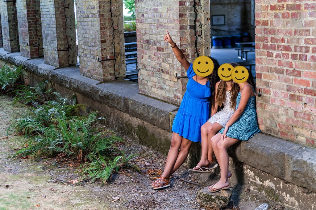 Children wondering in awe at manchester state park in kitsao washignton, faces covered for privacy