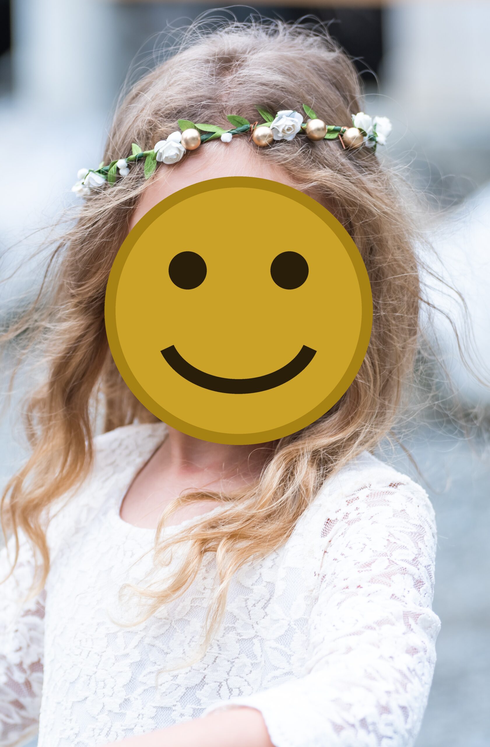 Portrait of a young girl at a Buckley Washington wedding wearing white. children's boutiques Port Orchard, faces covered for privacy